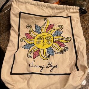 Brighton Sunburst Canvas Bag with Vibrant Accents storage bag